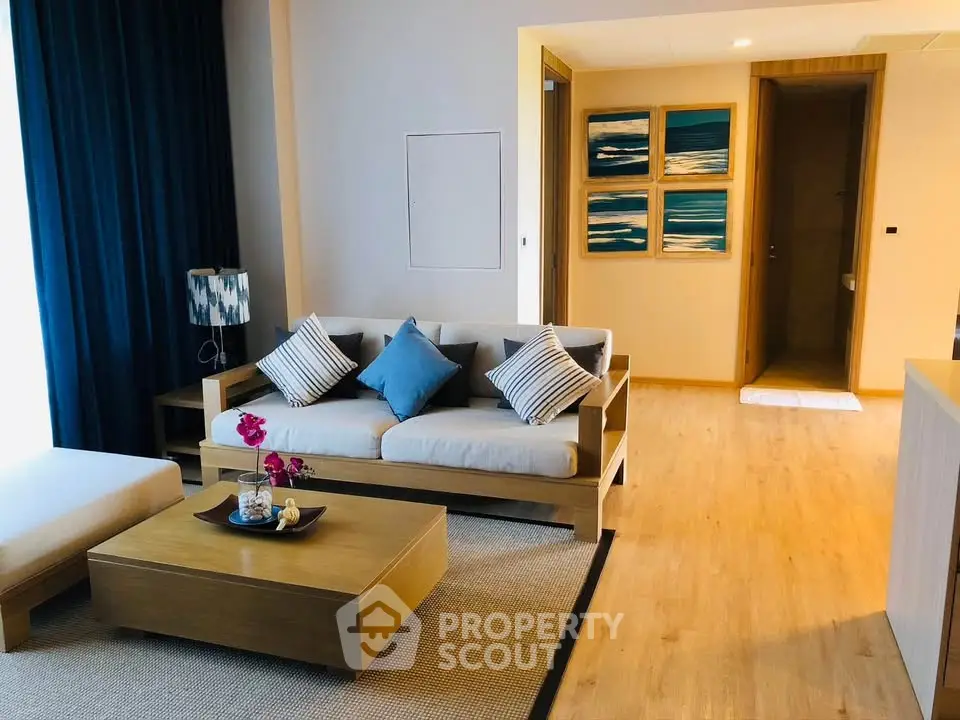 Modern living room with stylish decor and cozy seating area in a contemporary apartment.