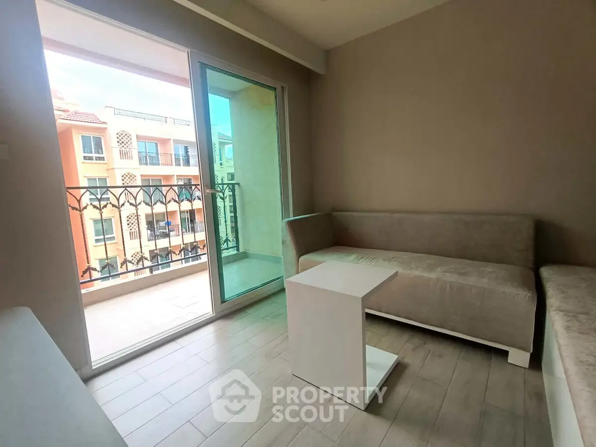 Modern living room with balcony view in a stylish apartment