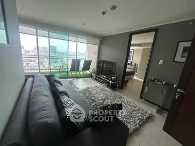 Modern living room with city view and stylish decor in urban apartment