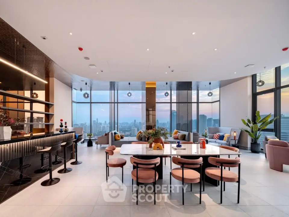 Luxurious open-plan living and dining area with panoramic city views and modern decor.