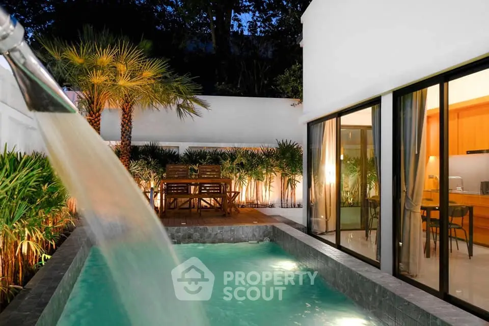 Luxurious villa with private pool and elegant outdoor dining area