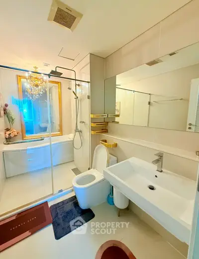Luxurious modern bathroom with elegant fixtures and spacious shower area