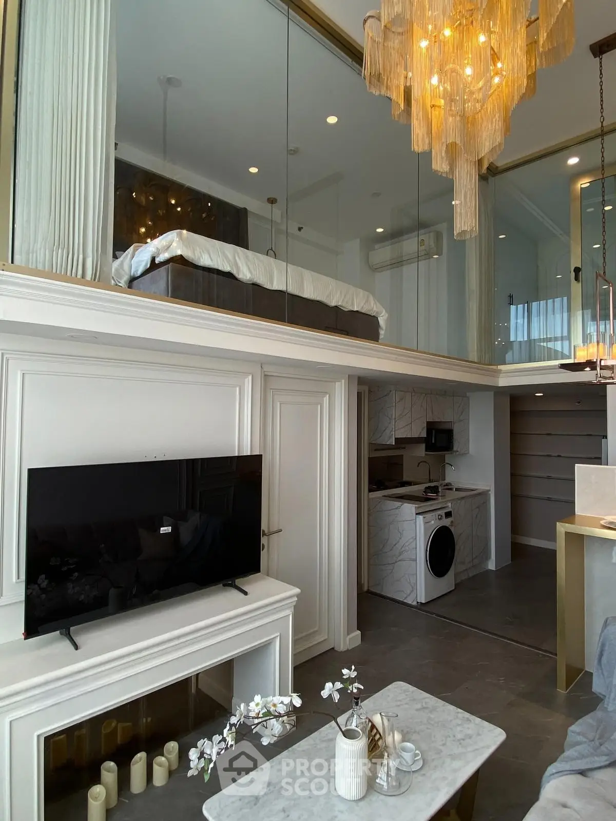 Luxurious loft apartment with modern decor and elegant chandelier