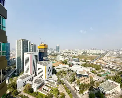 Stunning cityscape view from high-rise building balcony