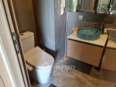 Modern bathroom with sleek fixtures and stylish vanity