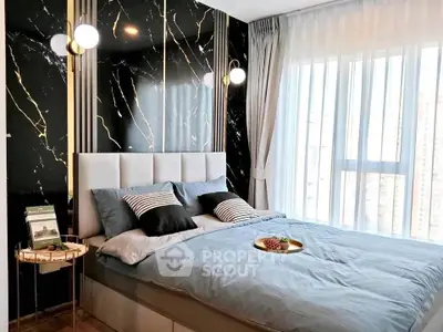 Luxurious bedroom with modern decor and large window view