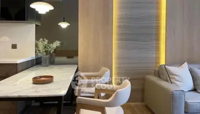 Modern living room with elegant lighting and stylish furniture