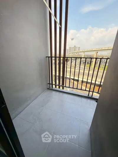 Modern balcony with city view and sleek railing design