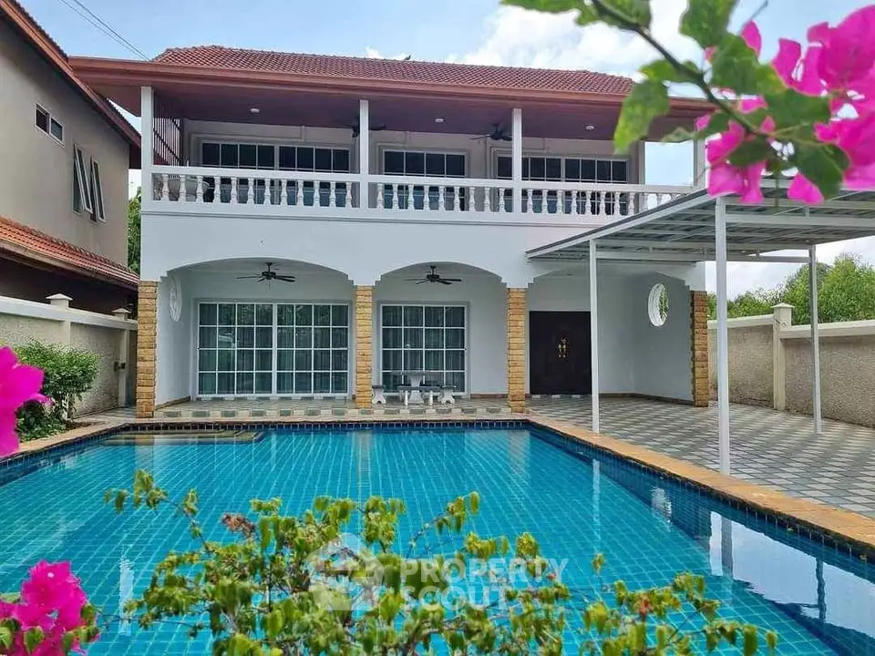 Stunning two-story villa with private pool and spacious balcony, perfect for luxurious living.