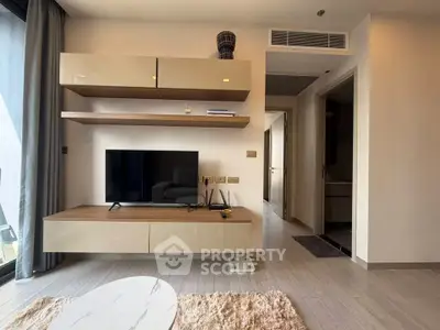 Modern living room with sleek TV unit and stylish decor