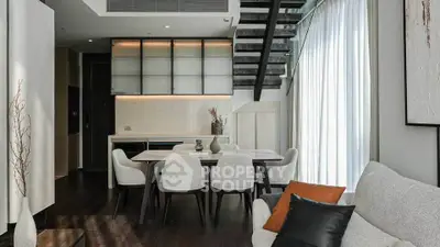 Modern duplex living room with elegant dining area and stylish decor