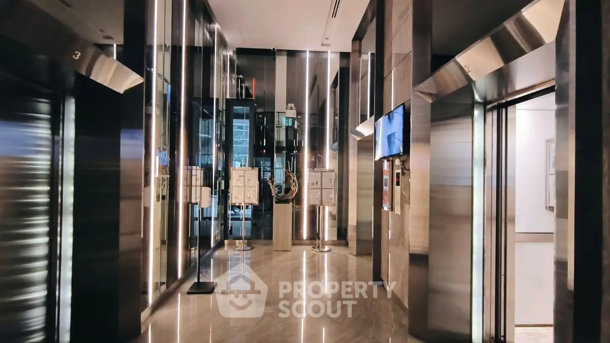 Luxurious modern elevator lobby with sleek design and polished finishes
