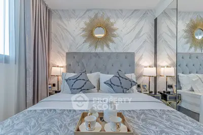 Luxurious bedroom with elegant decor and plush bedding