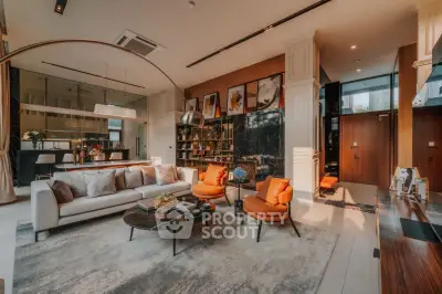 Luxurious modern living room with elegant decor and open kitchen layout
