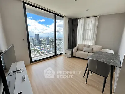 Modern living room with stunning city view and sleek furniture