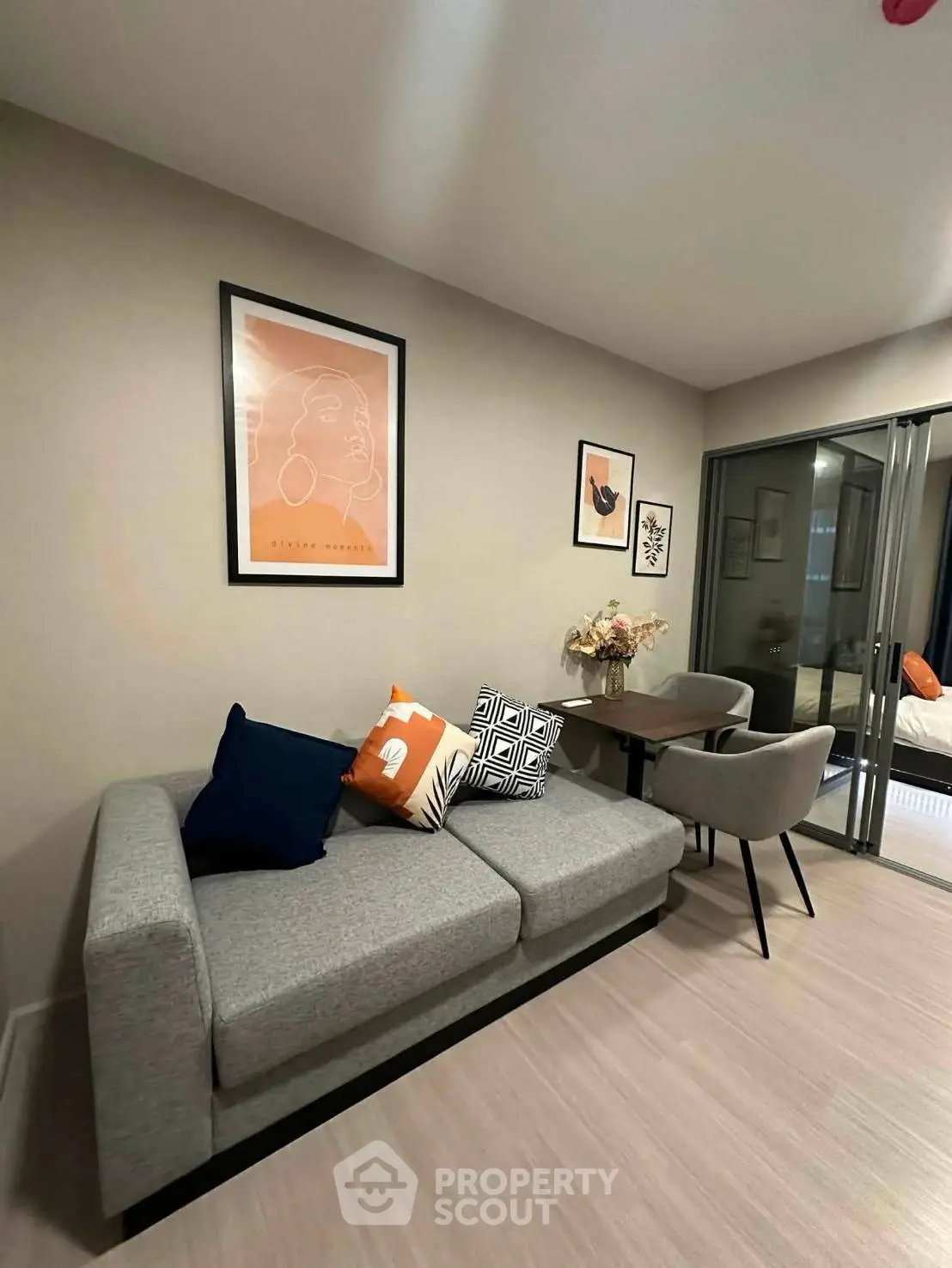 Modern living room with stylish decor and cozy seating area in a contemporary apartment.