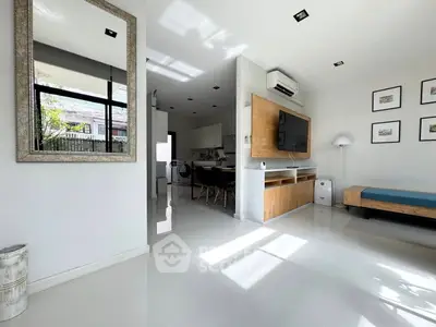 Modern living room with sleek design and natural light