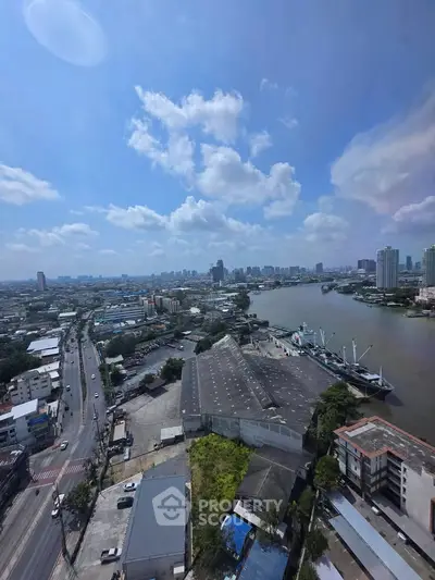 Stunning cityscape view with river and skyline, perfect for urban living enthusiasts.