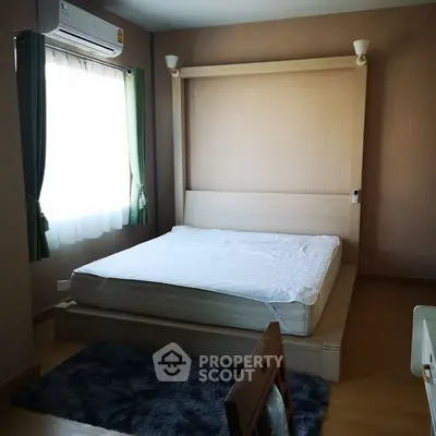 Cozy bedroom with modern design and natural light