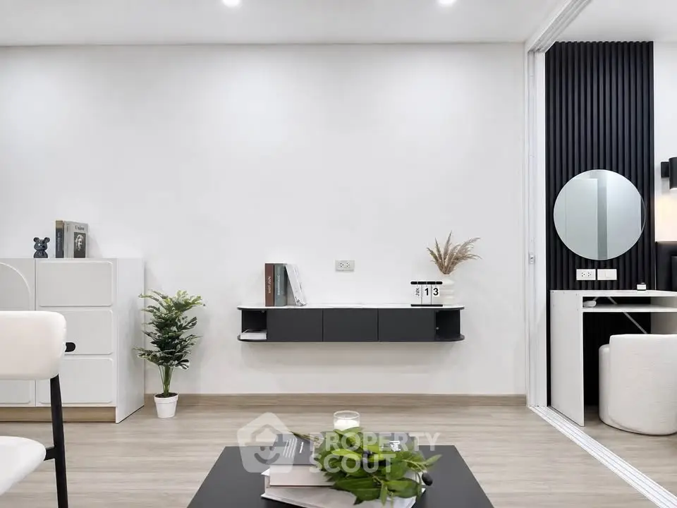 Modern minimalist living room with sleek furniture and stylish decor