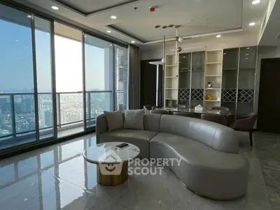 Luxurious living room with panoramic city view and modern furnishings