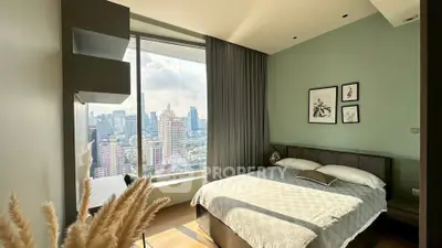 Luxurious bedroom with stunning city view and modern decor