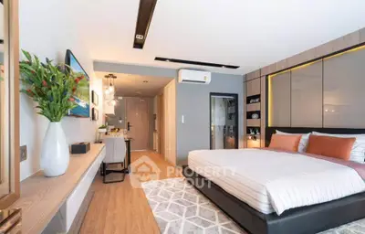 Modern bedroom with stylish decor and spacious layout