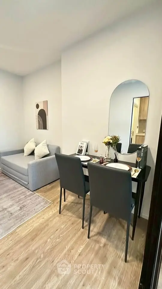 Modern living room with cozy dining area and stylish decor