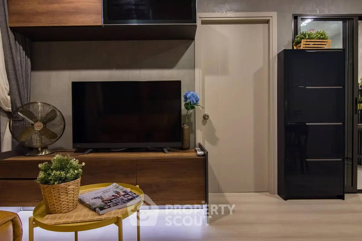 Modern living room with stylish decor and entertainment center