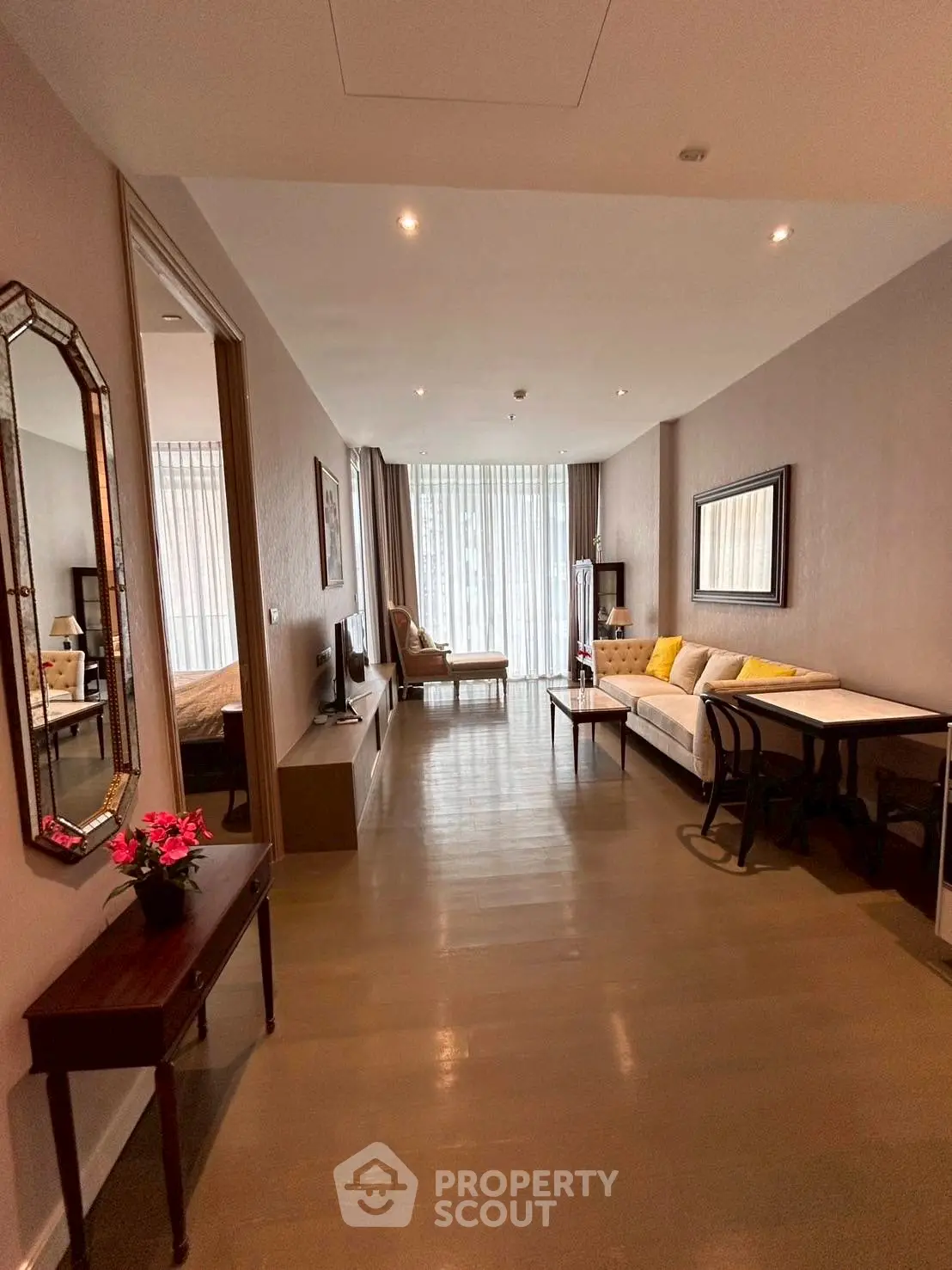 Spacious living room with elegant decor and natural light