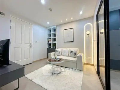 Modern living room with cozy sofa and stylish decor