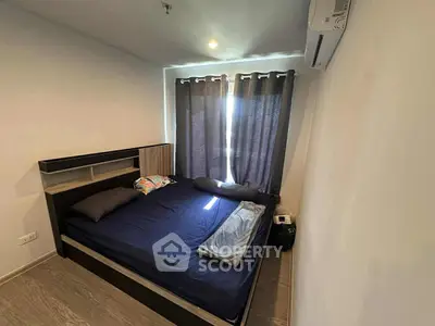 Cozy bedroom with modern furnishings and natural light