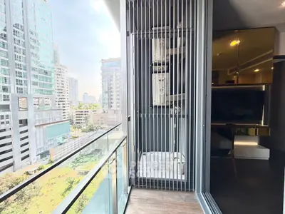 Modern apartment balcony with city view and sleek interior design
