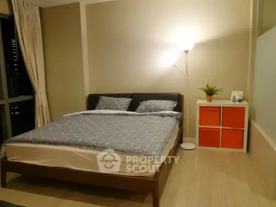 Modern bedroom with stylish decor and cozy ambiance in urban apartment