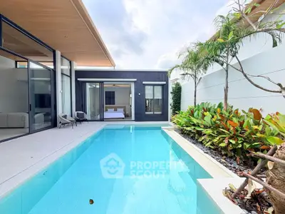 Luxurious modern villa with private pool and lush garden, perfect for relaxation and leisure.