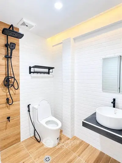 Modern bathroom with sleek fixtures and stylish tile design