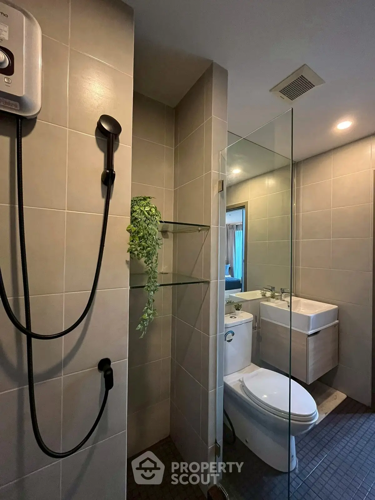 Modern bathroom with glass shower and sleek fixtures