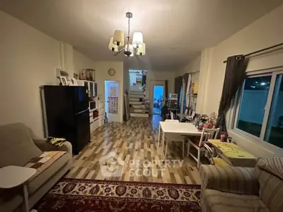 Cozy living room with modern decor and wooden flooring