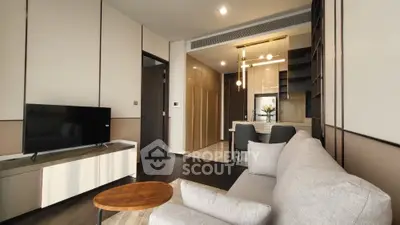 Modern living room with sleek furniture and open layout
