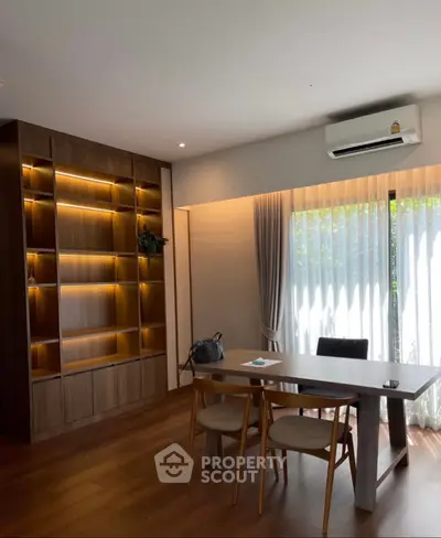 Modern living room with stylish wooden furniture and natural light