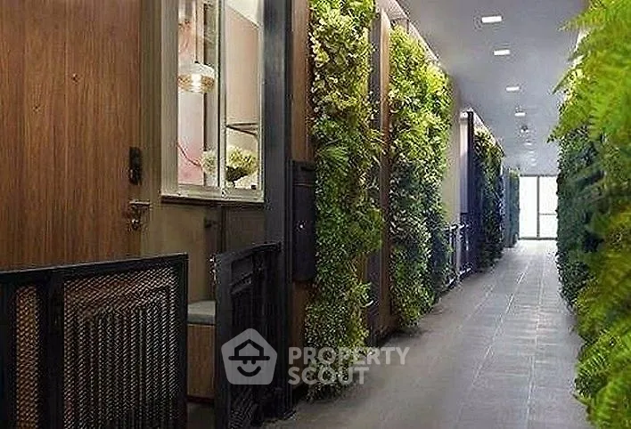 Modern hallway with vertical garden walls and sleek design
