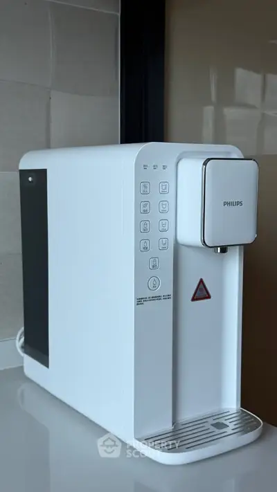 Modern kitchen appliance on countertop, sleek design perfect for contemporary homes.