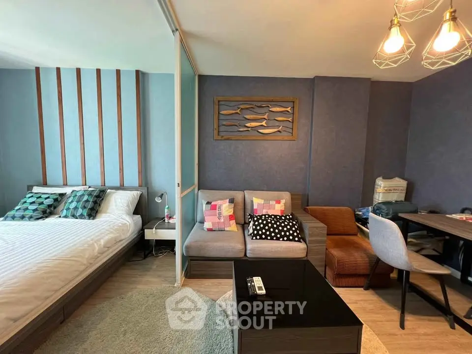 Modern studio apartment with stylish decor and cozy living area
