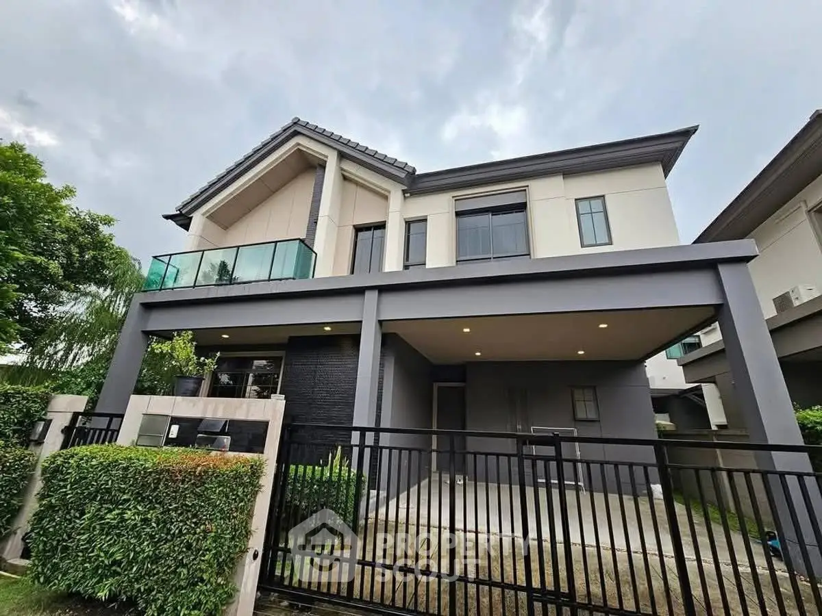 Modern two-story house with sleek design and spacious balcony