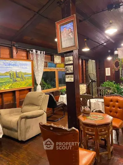 Charming rustic living room with wooden interiors and vintage decor, perfect for cozy gatherings.