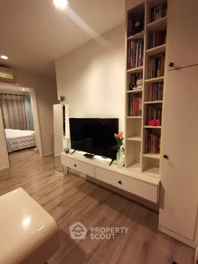 Cozy living room with built-in shelves and modern decor