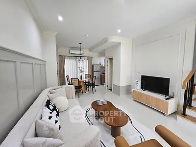 Spacious modern living room with elegant decor and open layout