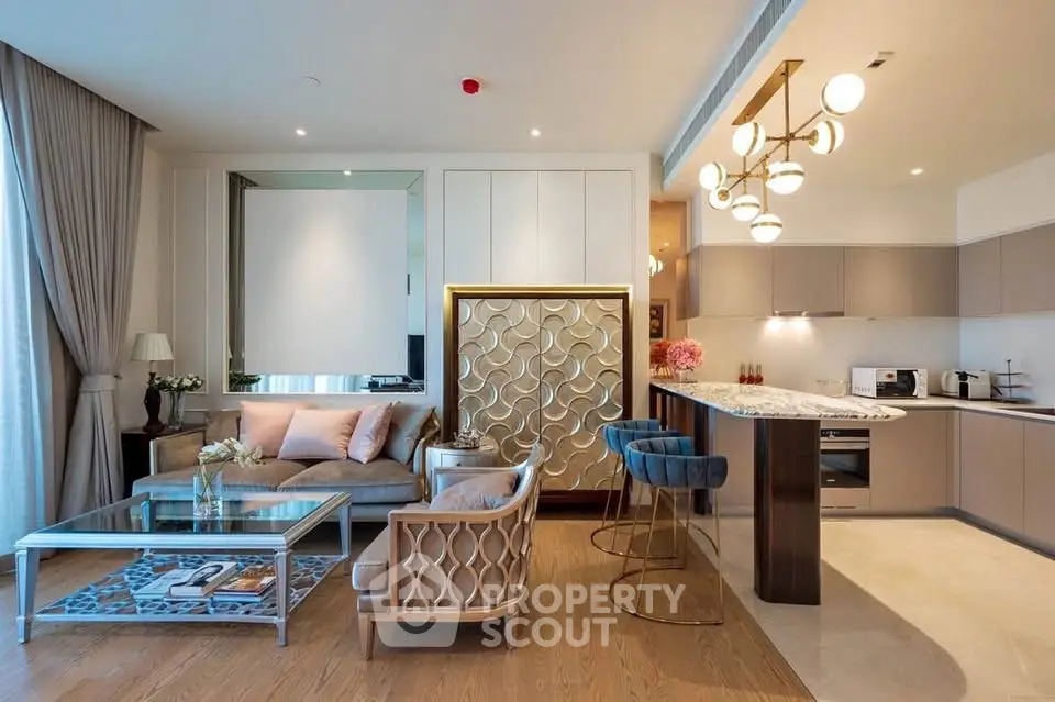 Luxurious open-plan living room with modern kitchen and elegant decor