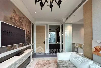 Luxurious living room with elegant decor and city view, featuring a plush sofa and stylish wall art.