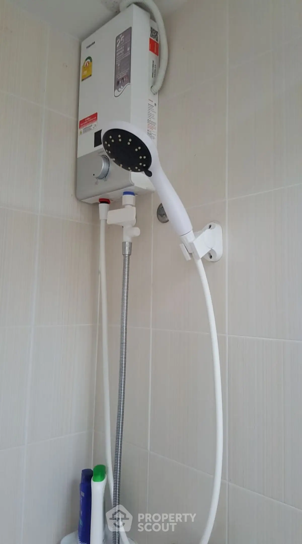 Modern bathroom with water heater and shower head installation